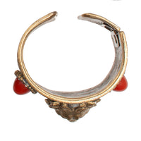 VINTAGE CARVED LION'S HEAD & GLASS STONE CUFF
